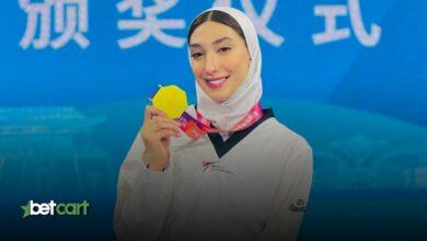 مبینا نعمتزاده با لباس تکواندو و مدال طلای رقابتهای جهانی ۲۰۲۴